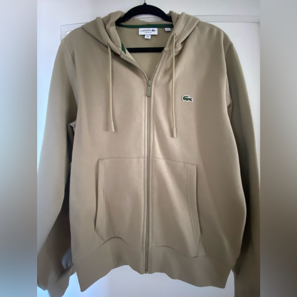 NWOT Mens Lacoste zippered hoodie. In excellent condition. Worn once.